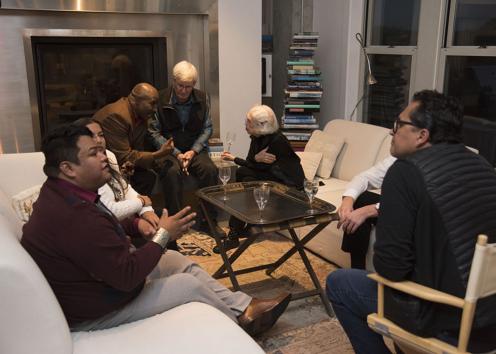 Artists and scholars in discussion at a private residence, 2018. Photograph by Ryan Waggoner © Spencer Museum of Art, The University of Kansas.